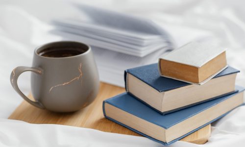 arrangement-with-books-cup-board