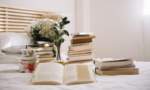 books-bouquet-bed-morning