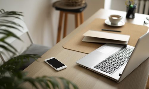 high-angle-desk-arrangement-with-laptop