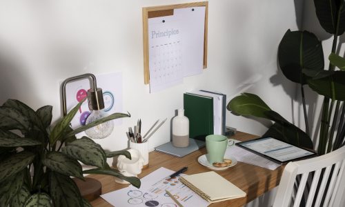 high-angle-desk-arrangement-with-notebooks-statistics