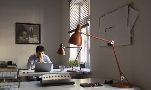 medium-shot-anxious-man-working